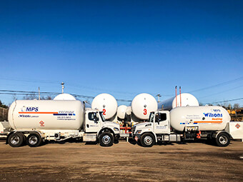 Propane delivery trucks and tanks